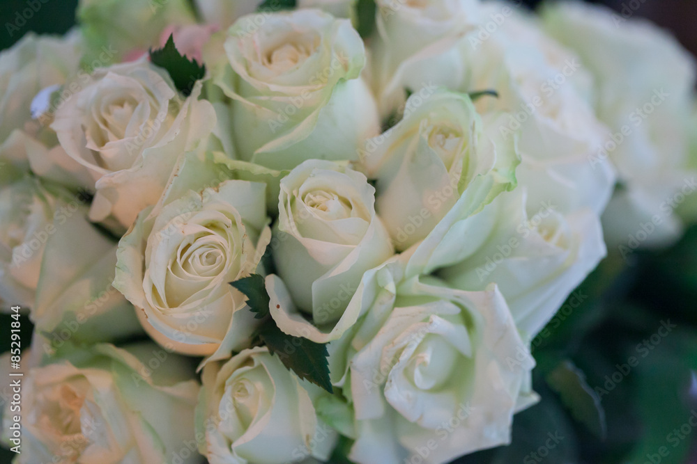 Wedding bouquet of white roses in the bride room Wedding bouquet of white roses in the bride room
