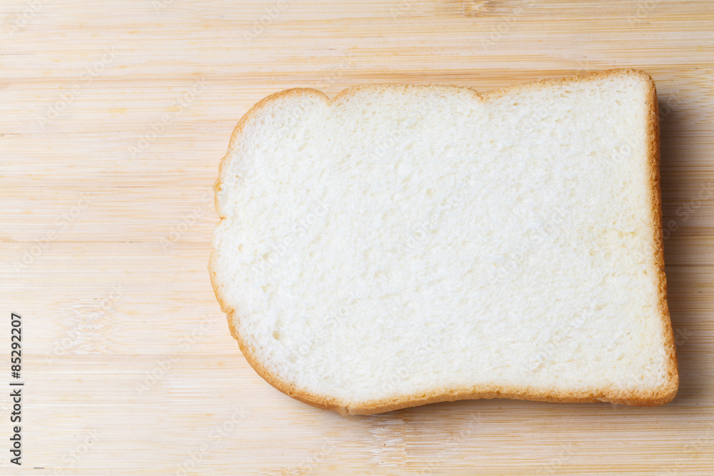 Slice of white bread isolated on white background.