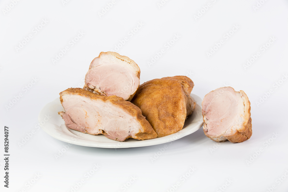 tender brisket sliced on plate on white background
