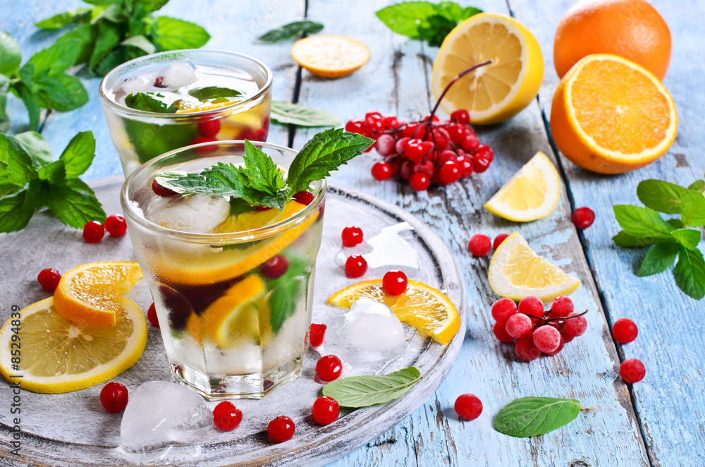 Drink with citrus and berries Drink with citrus and berries
