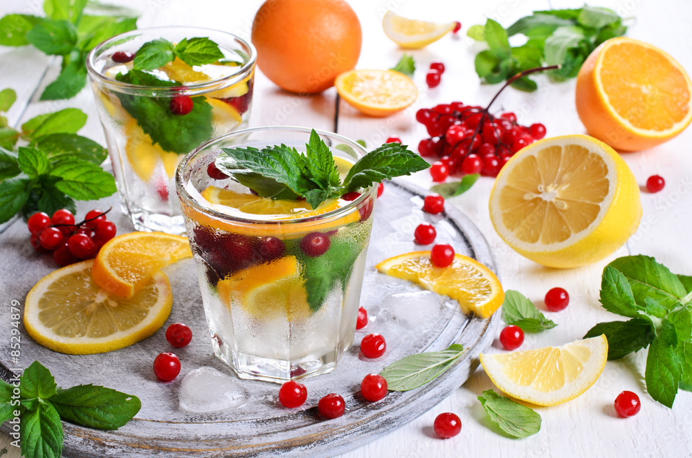 Drink with citrus and berries Drink with citrus and berries