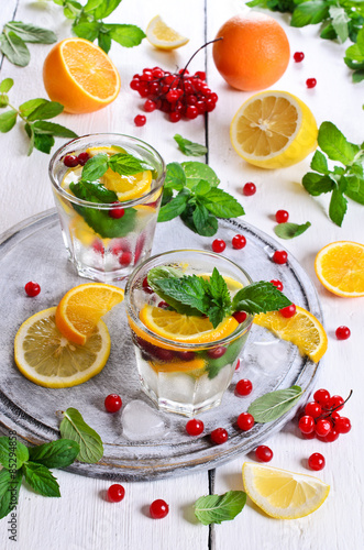 Drink with citrus and berries