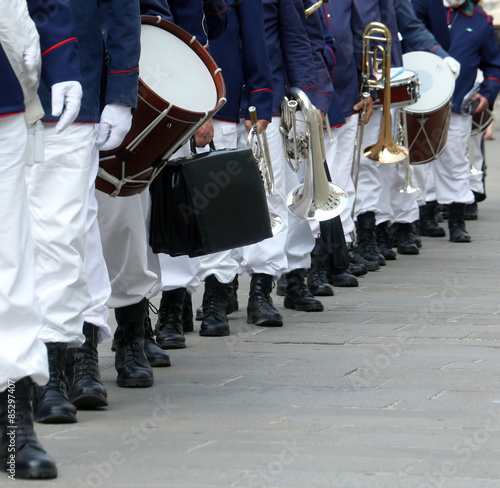 Parade of musicians of the band in full uniform on the town stre