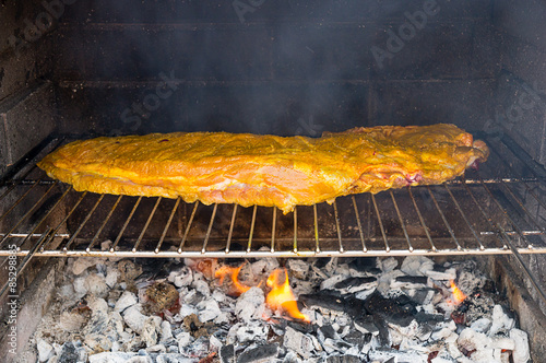 ribs on a barbecue photo