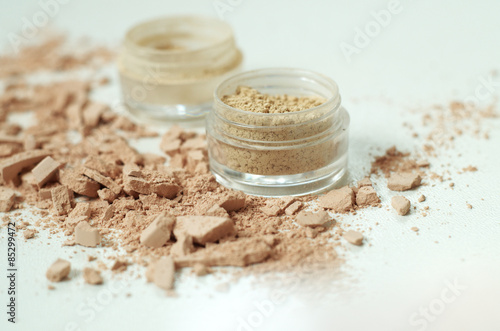 Make up mineral powder in plastic jar  on white background