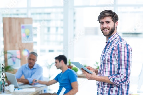 Businessman holding a tablet