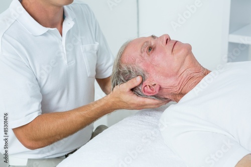 Man receiving neck massage 