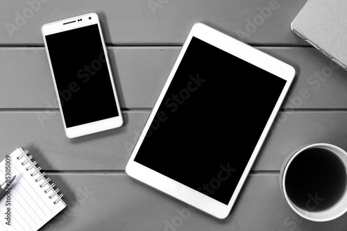 Digital tablet and smart phone on the working desk