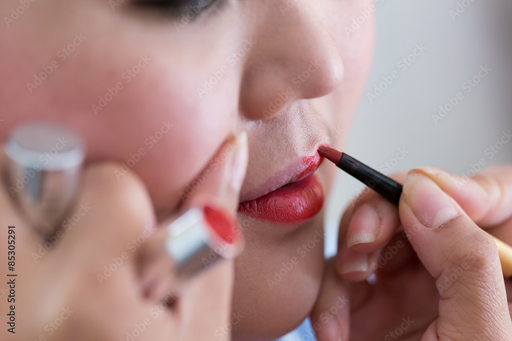 red lipstick of makeup with cosmetic for woman
