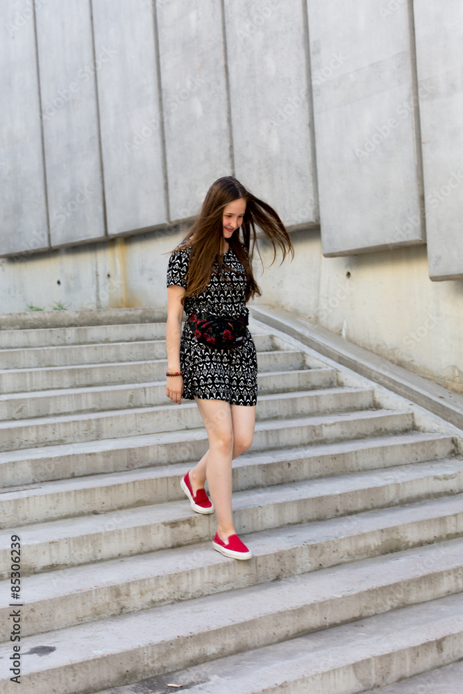 portrait of cool young and beautiful caucasian blonde teenager hipster girl with long gorgeous hair is posing smiling and having fun portrait of cool young and beautiful caucasian blonde teenager hipster girl with long gorgeous hair is posing smiling and having fun
