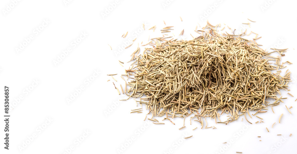 Dried rosemary herb leaves over white background