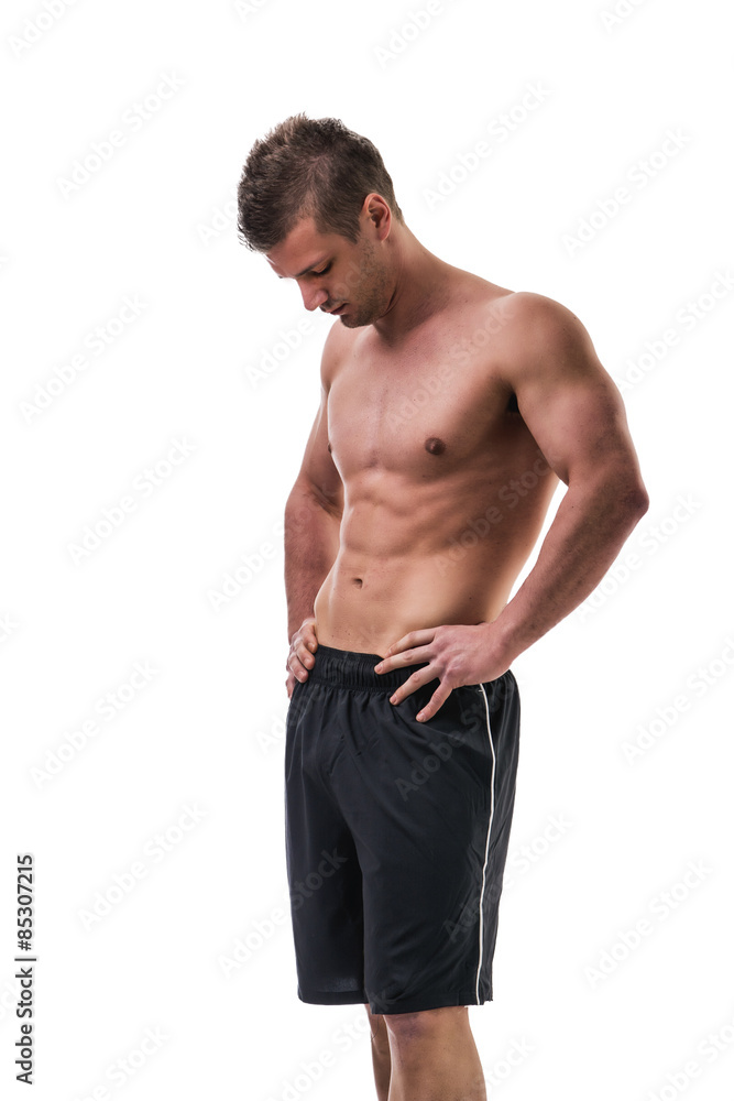Handsome young bodybuilder in relaxed pose Handsome young bodybuilder in relaxed pose