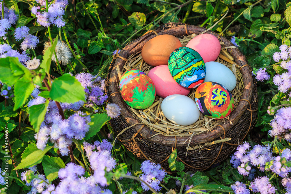 colorful easter eggs in grass nest. colorful easter eggs in grass nest.