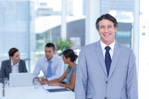 Smiling businessman looking at camera © WavebreakMediaMicro