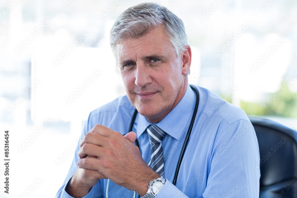 Smiling doctor looking at camera Smiling doctor looking at camera