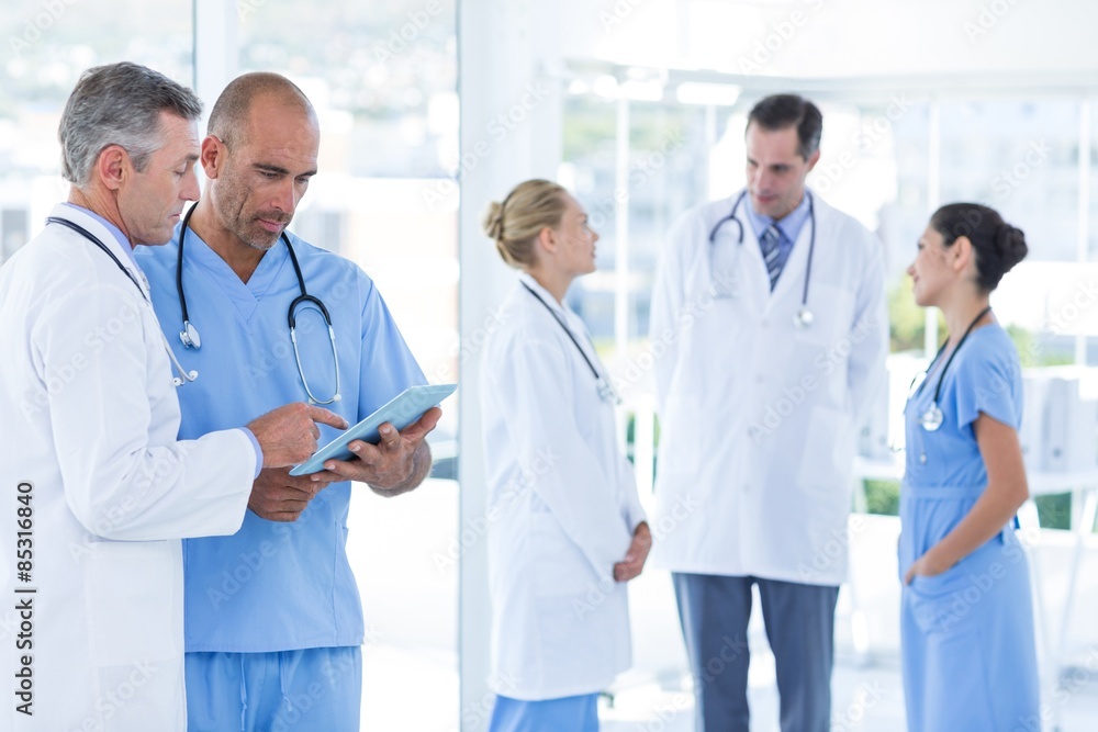 Team of doctor discussing together Team of doctor discussing together