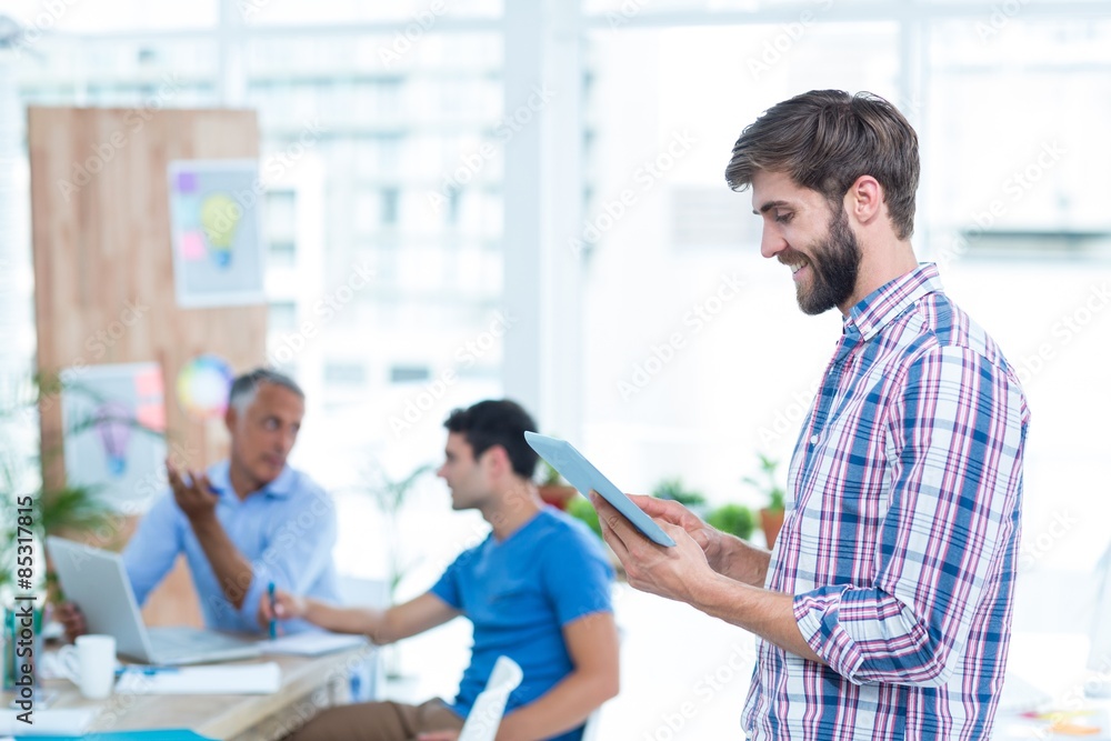 Businessman holding a tablet Businessman holding a tablet