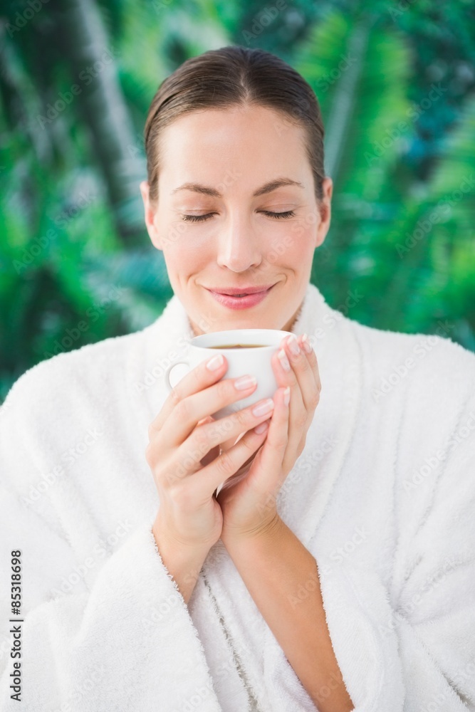 Close up portrait of a beautiful young woman drinking a tea Close up portrait of a beautiful young woman drinking a tea