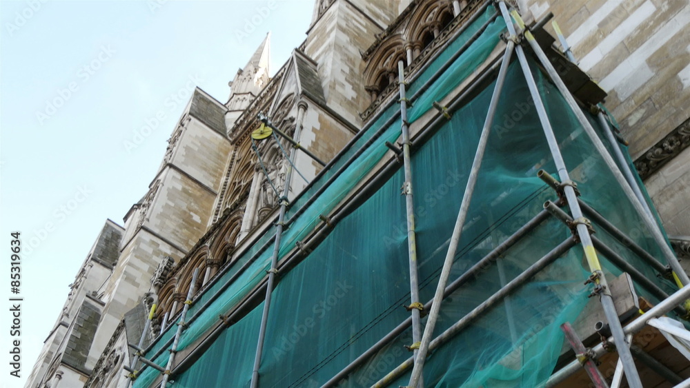 Part of Westminster Abbey is under construction There are some construction materials outside the church Part of Westminster Abbey is under construction There are some construction materials outside the church