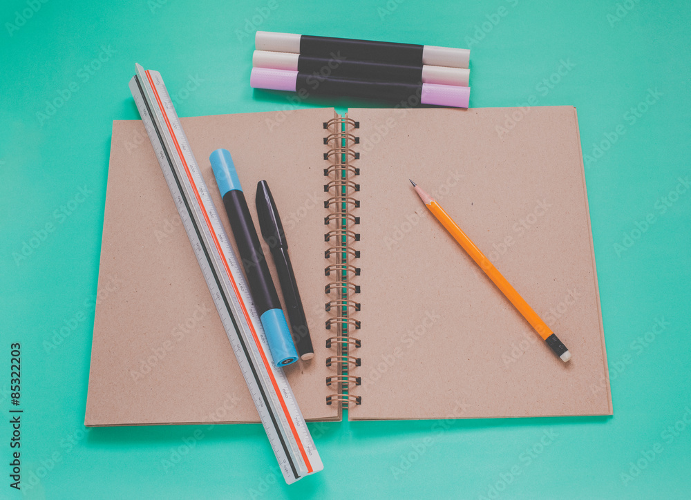 Brown blank sketch book and stationary office for sketching Brown blank sketch book and stationary office for sketching