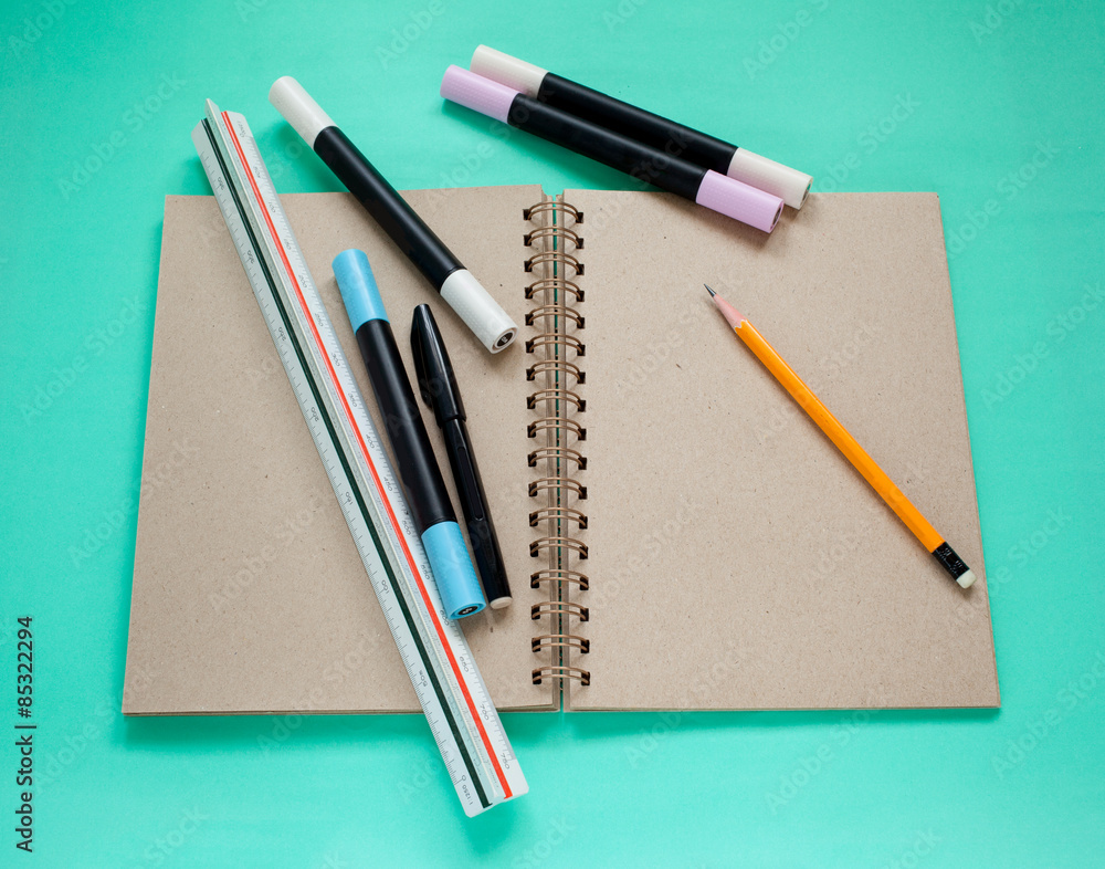 Brown blank sketch book and stationary office for sketching Brown blank sketch book and stationary office for sketching