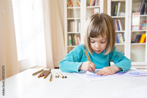 Little girl drawing photo