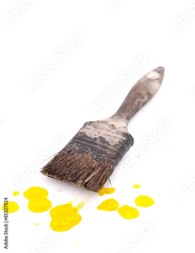 Old used paint brush and sponge