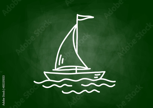 Drawing of sailboat on blackboard