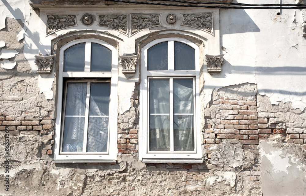 Fototapeta premium old dirty window on old dirty wall