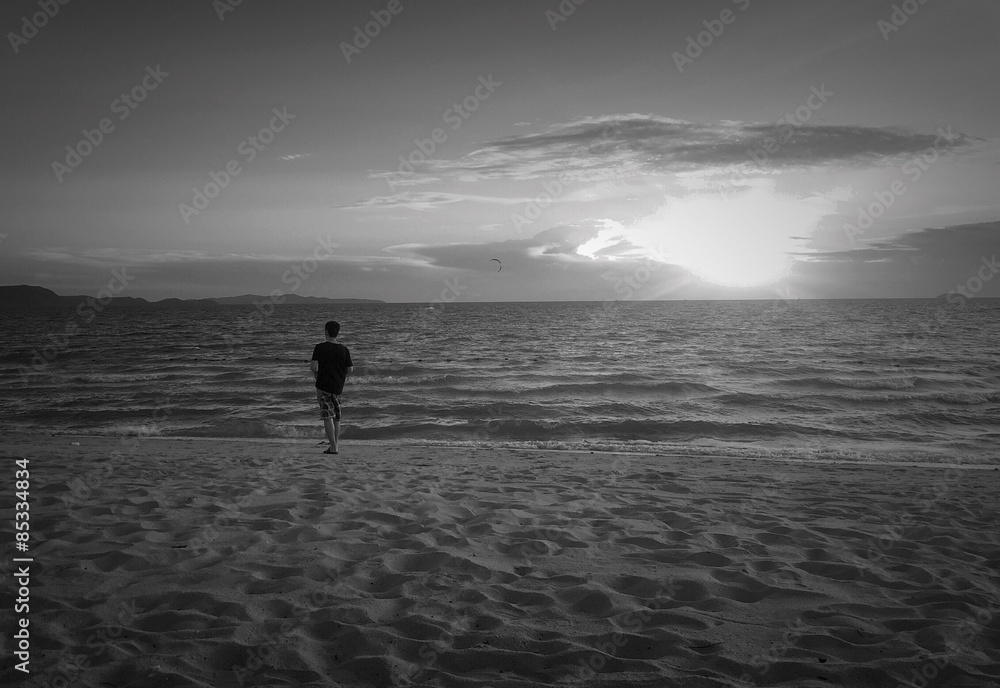 man walk on the beach
