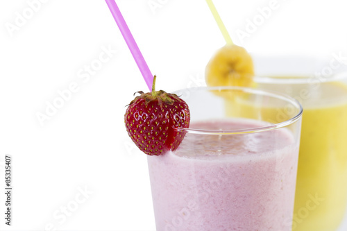 Milk shakes from different fruits isolated on white