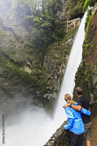 Ecuador, Tungurahua, Banos de Agua Santa, tourists at waterfall Pailon del Diablo photo