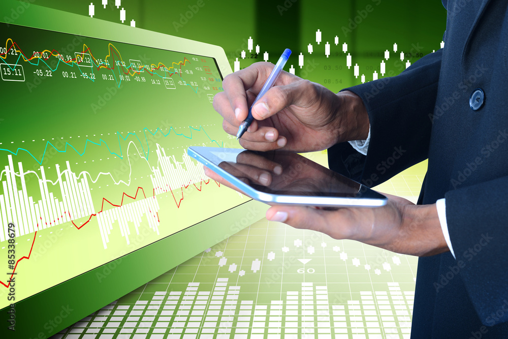 Fototapeta premium Business man calculating the digital tablet