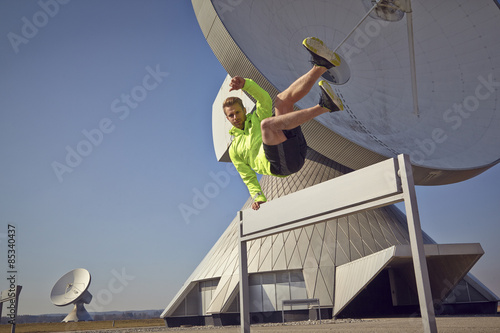 Germany, Raisting, sportive young man at ground station