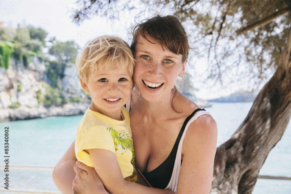 Spain, Mallorca, Porto Christo, portrait of mother and little son Spain, Mallorca, Porto Christo, portrait of mother and little son