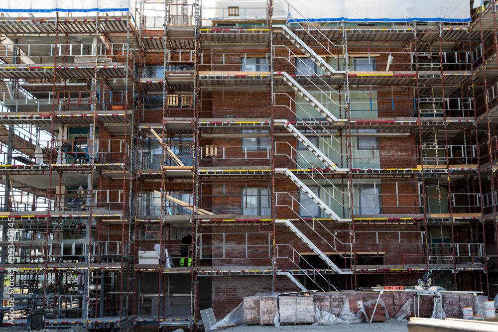 Construction of new apartments with scaffolding