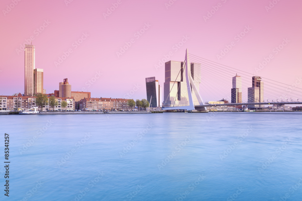 Netherlands, County of Holland, Rotterdam, View to Erasmus bridge and the skyline in the evening Netherlands, County of Holland, Rotterdam, View to Erasmus bridge and the skyline in the evening