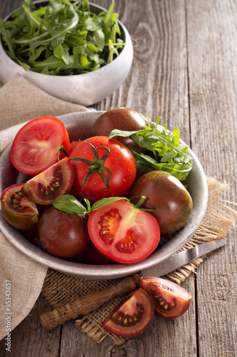 Ripe fresh tomatoes in a bowl