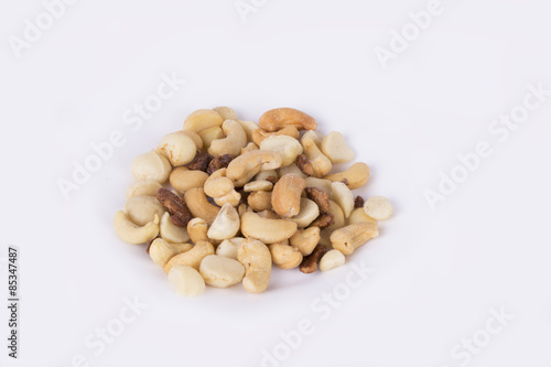cashew / macadamia nuts / roasted almonds isolated on white background (studio)