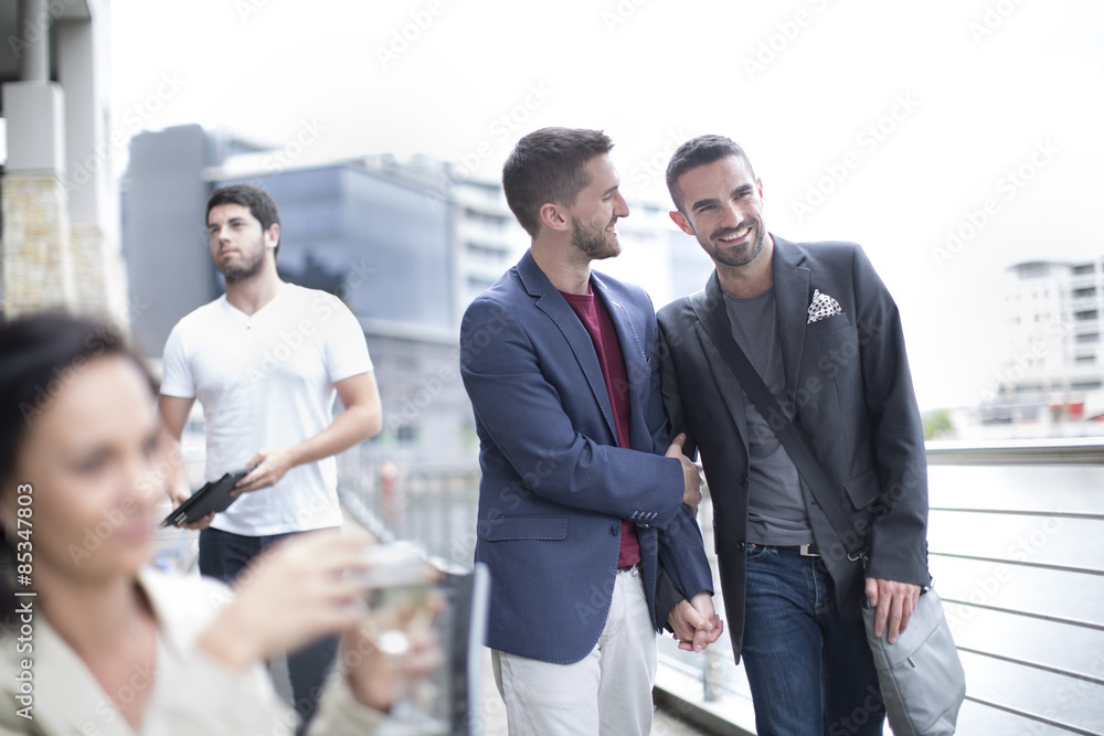 Gay couple walking together Gay couple walking together