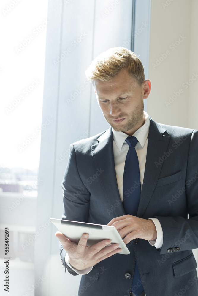Businessman using digital tablet Businessman using digital tablet