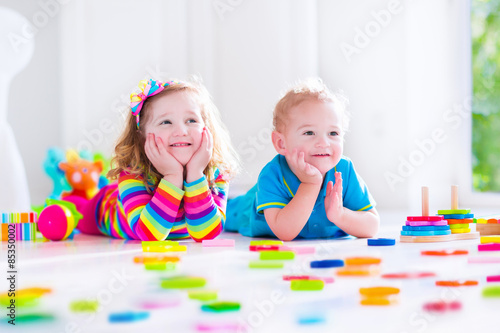 Kids playing with wooden blocks