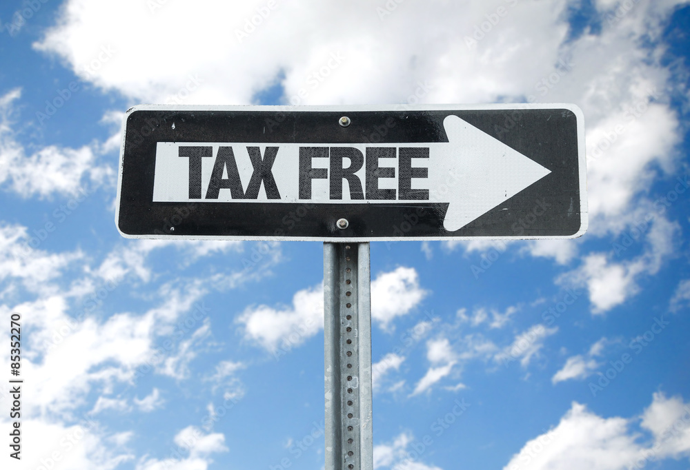 Tax Free direction sign with sky background Tax Free direction sign with sky background