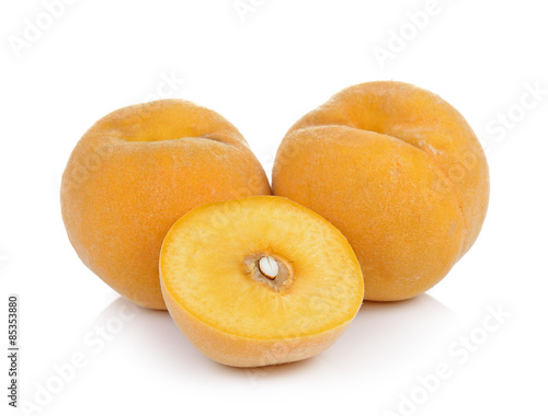  ripe yellow peach on white background