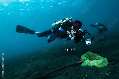 diver take a photo video upon coral lembeh indonesia scuba diving