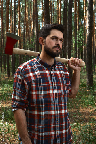 Serious Lumberjack in a Wood