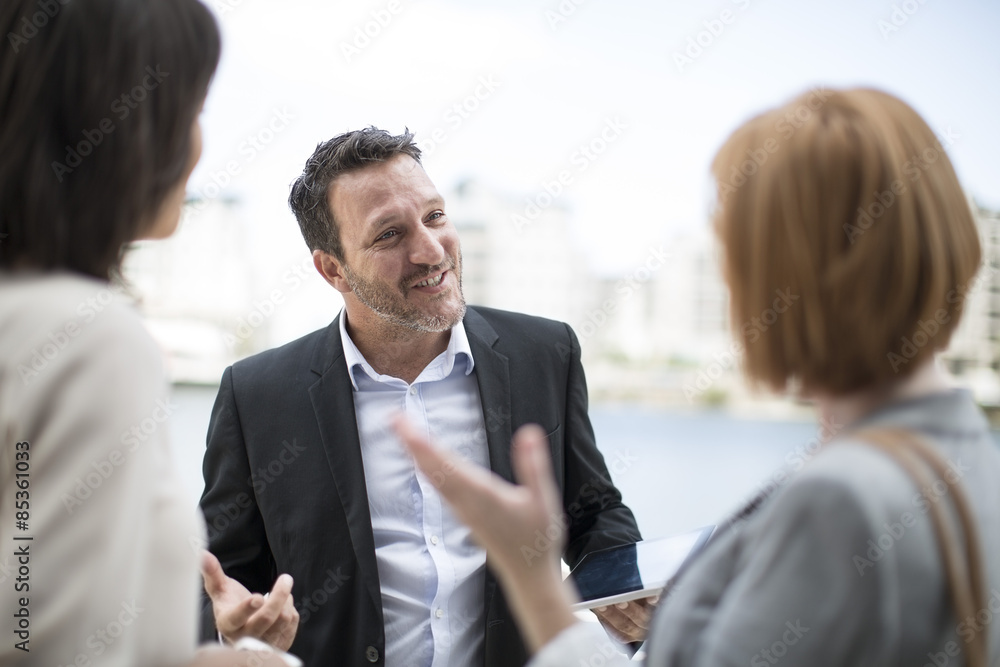 Business colleagues meeting outside the office Business colleagues meeting outside the office