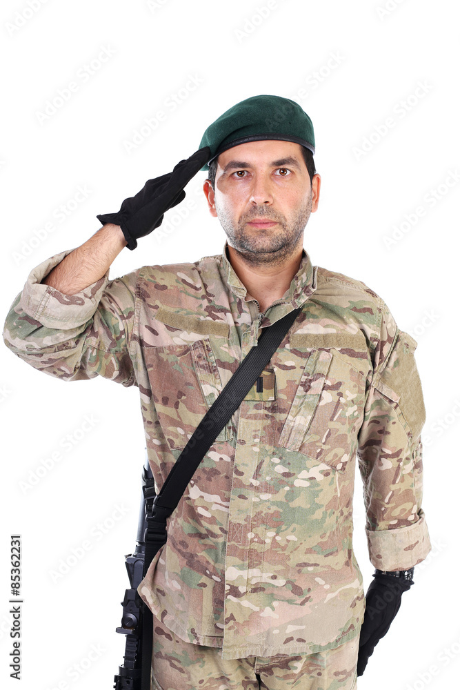 Portrait of young army soldier saluting Portrait of young army soldier saluting