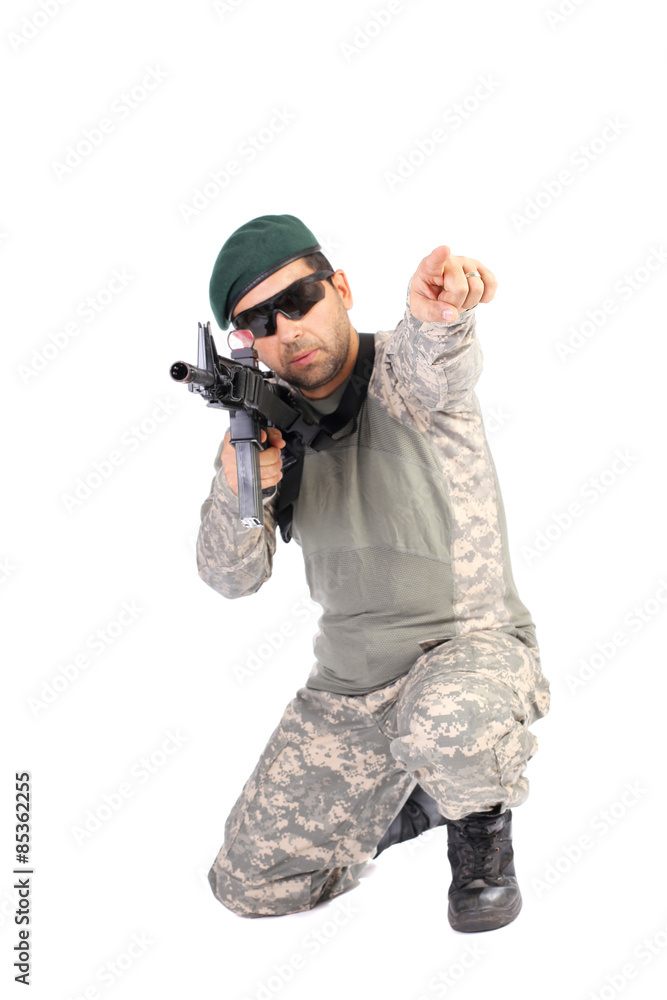 Portrait of soldier or commander holding his rifle and pointing Portrait of soldier or commander holding his rifle and pointing