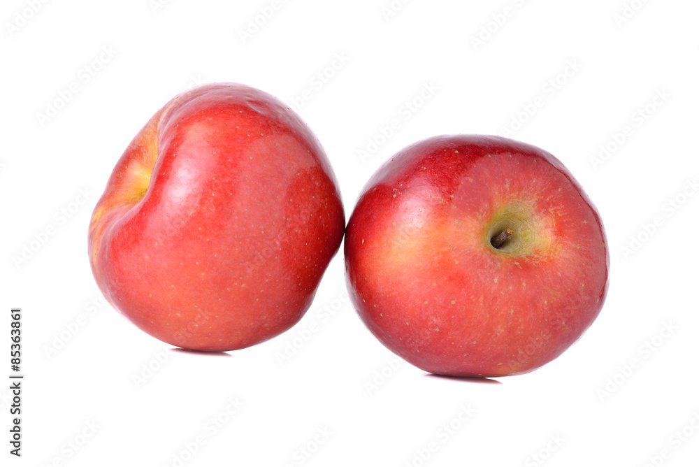 Obraz premium red apples with stem on white background